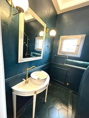 a bathroom with a sink and a mirror at Boutique3436 Luxury Apartment in Athens