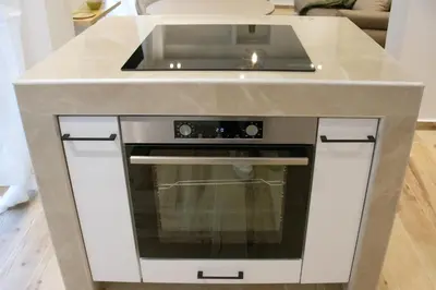 a kitchen counter with a sink and an oven at Apartment in Athens Neos Kosmos in Athens