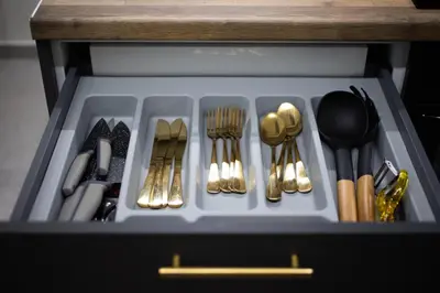 a drawer filled with utensils and silverware at Cesily 2-Bedroom Apartment in Athens in Athens
