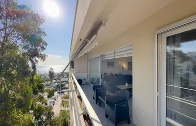an apartment balcony with a view of the ocean at Kanari Sea View 55sqm apt in Alimos in Athens