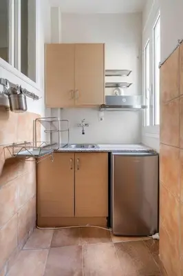 a kitchen with a sink and a dishwasher at STM Monastiraki Acropolis Apt in Athens