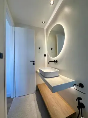 a bathroom with a sink and a mirror at BlueMotion - CruiseHub 3B in Piraeus