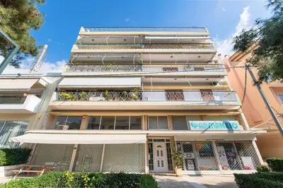 a building with balconies on the side of it at Artsy Spacious Cozy Apartment in Glyfada Center in Athens