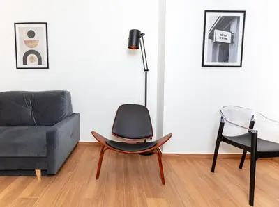 a living room with a couch and a chair at Apartment near City Center in Athens