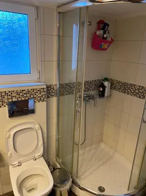 a bathroom with a shower and a toilet at House close to the port Piraeus and metro station in Piraeus