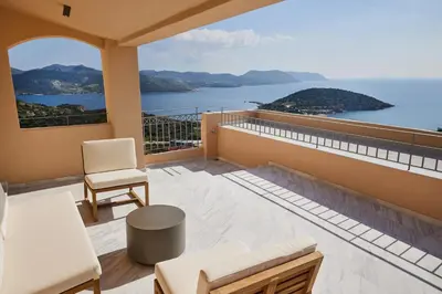 a balcony with a view of the water at Athens Riviera Villa in Anavissos