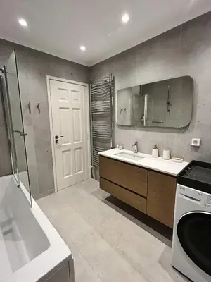 a bathroom with a sink and a toilet and a shower at Athens Riviera Villa in Anavissos