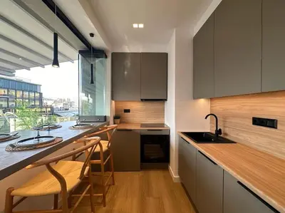 a kitchen with a counter and a sink and a counter top at BlueMotion - SensaBlu #2 in Piraeus
