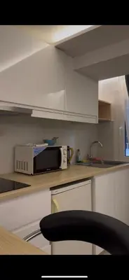 a kitchen with a microwave and a counter top at Athens Stay 40 in Athens