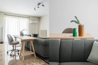 a living room with a couch and a table at Exclusive 2BR Apartment in Alimos by UPSTREET in Athens