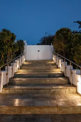 a set of stairs with lights on them at Astarte Sunset Villa in Sounio