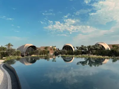 a view of a pool of water with three domes at 91 Athens Riviera, The Resort in Athens