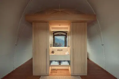 a bathroom with a sink in the middle of a room at 91 Athens Riviera, The Resort in Athens
