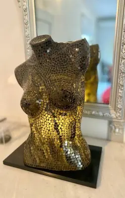 a gold vase sitting in front of a mirror at Dreamy relaxing secluded Villa Aurora in Palaiá Fókaia