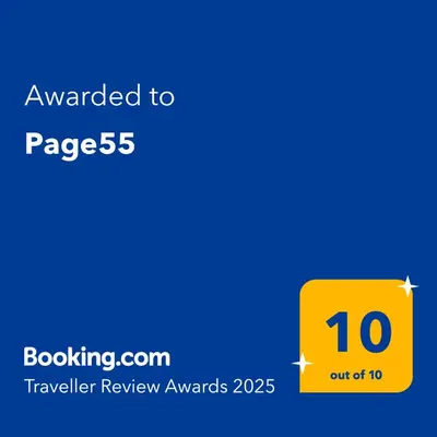 a yellow sign on a blue background at Page55 in Piraeus