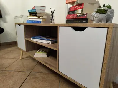 a book shelf with books on top of it at Page55 in Piraeus