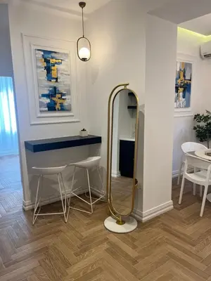 a dressing room with a blue counter and a mirror at White House Vouliagmeni 3-Free Parking ,Near the Sea in Athens