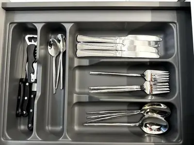 a tray filled with utensils in a sink at Cozy Elegant Residence #1 VIPGreece in Athens