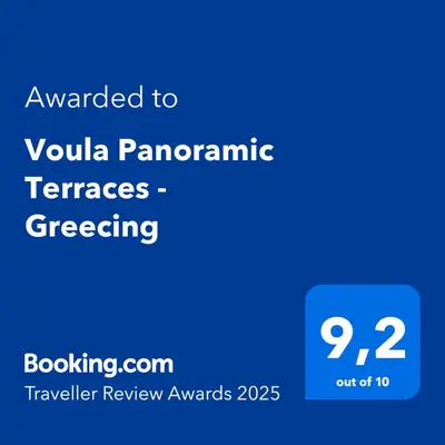 a screenshot of a cell phone with the text awarded to violania panamaran at Voula Panoramic Terraces - Greecing in Athens