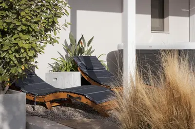a group of chairs sitting on a porch at Glyfada Panoramic Penthouse in Athens