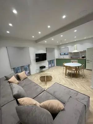 a living room with a couch and a table at Down Town Nea Smyrni in Athens