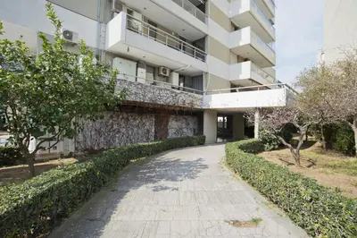 a walkway in front of a building at Belle Helene Luxury, Fully Reno, Athenian Riviera in Athens