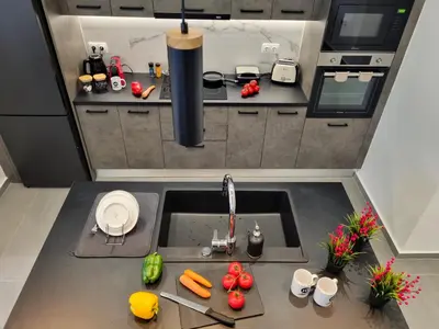 an overhead view of a kitchen with a sink at 10 Apartments & Suites Athens in Athens