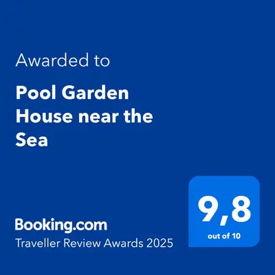 a screenshot of a phone with the text awarded to pool garden house near the sea at Pool Garden House near the Sea in Vari