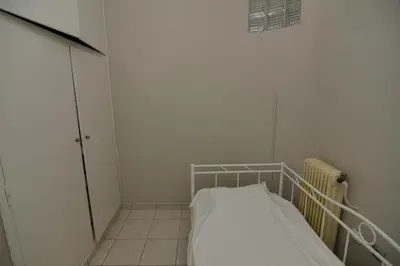 a hospital room with a hospital bed in a room at Athenian Riviera Beach front apartment 2 minutes from Tram stop in Athens