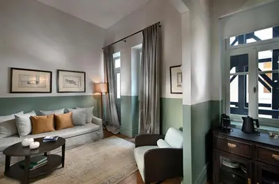 a living room with a couch and a table at Magnificent Athens Apartment 1 Bedroom Apartment Aldoron City View in Athens