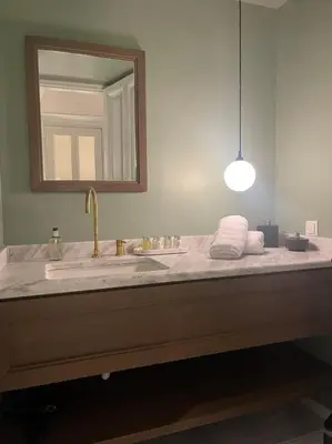 a bathroom with a sink and a mirror at Magnificent Athens Apartment 1 Bedroom Apartment Aldoron City View in Athens
