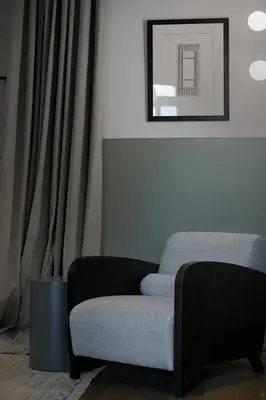 a living room with a couch and a chair at Magnificent Athens Apartment 1 Bedroom Apartment Aldoron City View in Athens