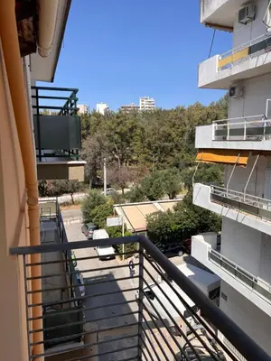 a view of a balcony of a building at Sunny Athens in Athens