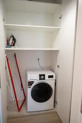 a washer and dryer in a small room at Elegant and cozy flat near Pagrati region (D1) in Athens