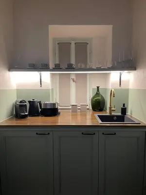 a kitchen with a counter top with a sink at Stunning Athens Apartment 1 Bedroom Apartment Juvia Athinaidos in Athens