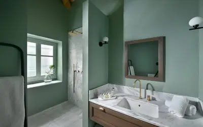 a bathroom with a sink and a mirror at Stunning Athens Apartment 1 Bedroom Apartment Juvia Athinaidos in Athens