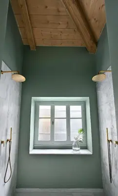 a bathroom with a window with a potted plant at Stunning Athens Apartment 1 Bedroom Apartment Juvia Athinaidos in Athens