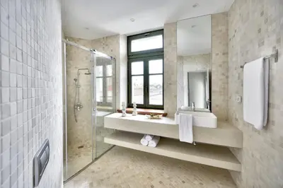 a bathroom with a shower and a sink and a mirror at Charming Athens Villa 1 Bedroom Villa Kyoraku Panoramic Acropolis View in Athens