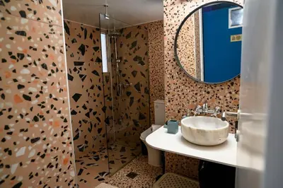 a bathroom with a sink and a mirror at BlueXenia 1 bedroom Retro Luxury in Athens