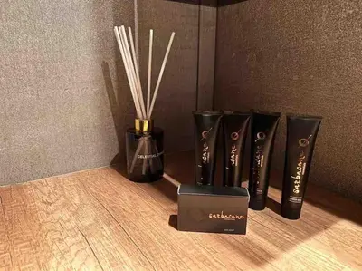 a group of black vases with straws in them at Metropolitan prestigious 2 bedroom luxury in Athens