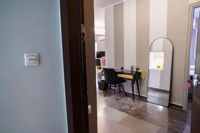 an office with a desk and a mirror in a room at Subtle 3 bed Luxury with a View in Athens