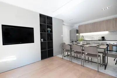 a kitchen and dining room with a table and chairs at Elegant 3BR apartment in the heart of Athens (Form_19) in Athens