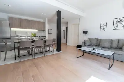 a living room with a couch and a table at Elegant 3BR apartment in the heart of Athens (Form_19) in Athens