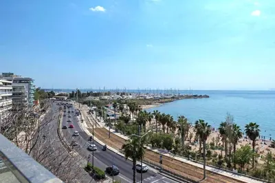 a view of a city with a beach and the ocean at Breathtaking seaview studio in Athenian Riviera in Athens