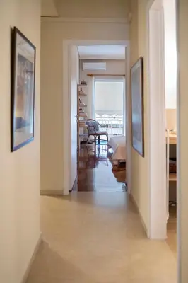 a hallway with a room with a view of a bedroom at Family Apt in Glyfada-Kyprou, by Comfortbnb in Athens