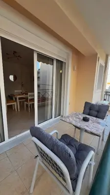 a living room with a couch and a table at H&H cozy retreat ,Fireplace and Parking in Piraeus