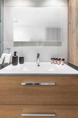 a kitchen with a sink and a counter top at Lemon Tree House Varkiza in Vari
