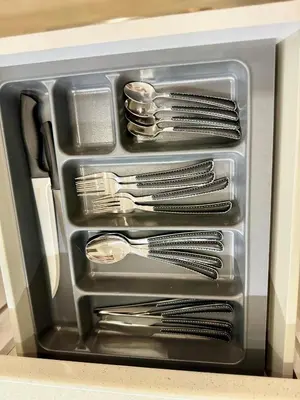 a metal container with utensils in it at Victoria Secret Suite greendom in Athens