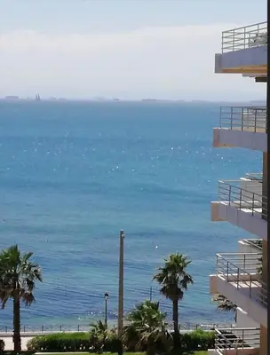 a view of the ocean from a building at Faliro Riviera Seaview flat in Athens