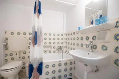 a bathroom with a toilet and a sink at Neos Kosmos metro st 1 bedrm 3 pers flat by MPS in Athens
